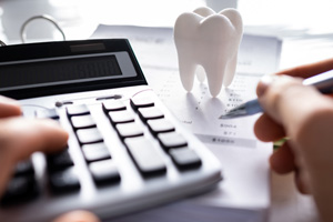 Patient in Boerne budgeting for cosmetic dentistry