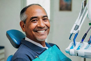 Partial denture isolated against neutral background